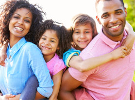 parents carrying their children