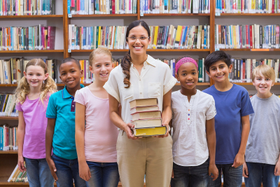 teacher and students smiling